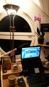 Where I'm usually found writing, in our library