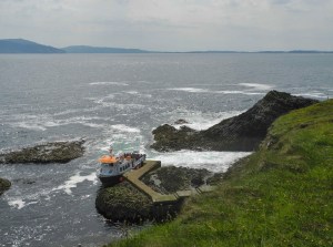 A larger ship than ours, boarding passengers at Staffa Pier.
