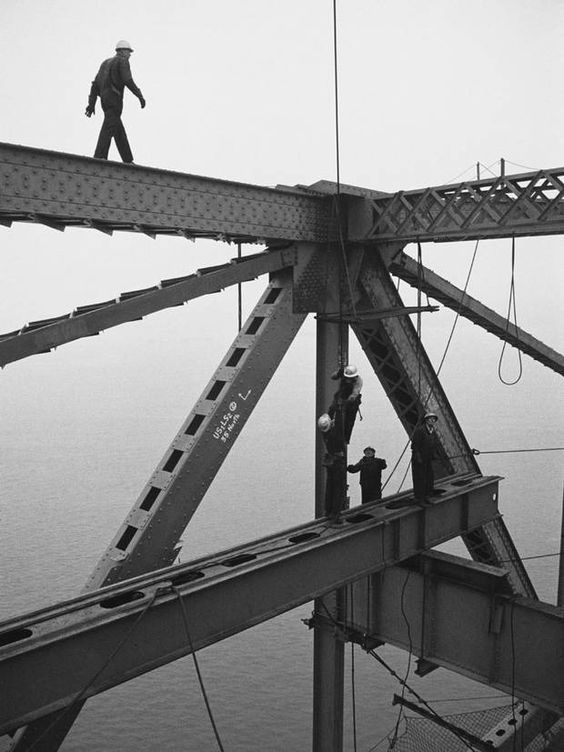 Construction workers building the Golden Gate Bridge